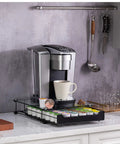 Space Saving K Cup Drawer Organizer With Glass Top Holds 42 Coffee Pods, under coffee maker on kitchen counter, black.