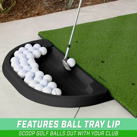 All Weather Golf Ball Tray For Hitting Mats, 70 Ball Capacity, black tray with golf balls on mat, ideal for backyard practice.