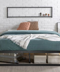 Queen Size Metal Platform Bed Frame With Reinforced Steel Slat Support And Absolutely No Box Spring Required No Sweat Assembly Heavy Duty Durable Mattress Foundation Built Like A Tank with teal bedding.