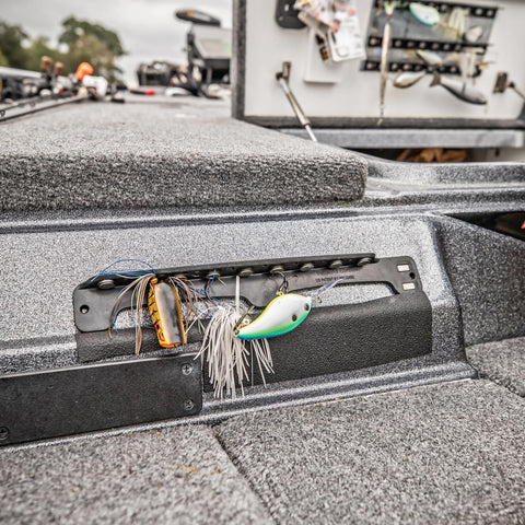 Magnetic Fishing Lure And Tool Organizer With Patented Design on boat, showcasing heavy duty neodymium magnets for secure lure changes.
