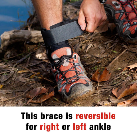 Person adjusting Deluxe Ankle Stabilizer With Adjustable Support In Black 1 Pack on right ankle outdoors, showing versatility.