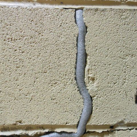 Caulk Saver Bulk Contractor Pack Three Eighths Inch Diameter 350 Feet Gray Durable Poly Foam in masonry crack