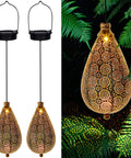 2 Pack Solar Hanging Lanterns With Raindrop Shape, Warm White LED Glow, Retro Iron Antique Bronze Finish in garden setting