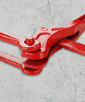 Close-up of red 4 Pack Lever Load Binder With 2 Grab Hooks For Five Sixteenth Or Three Eighths Grade 70 Transport Chain 5400 Lb Working Load Limit