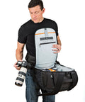 Person using Flipside 500 AW II Camera Backpack For Pro DSLR And Mirrorless Gear Fits 400mm Or 500mm Lens Space For 1 To 2 Bodies.