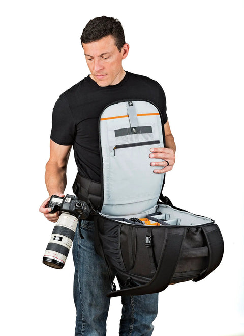 Person using Flipside 500 AW II Camera Backpack For Pro DSLR And Mirrorless Gear Fits 400mm Or 500mm Lens Space For 1 To 2 Bodies.