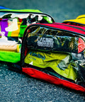 Lightning X color-coded first aid kit pouches with transparent windows, set of 4, front view.
