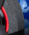 Close-up of grinding wheel on Eight Inch Heavy Duty Bench Grinder Workhorse Gutsy One Horsepower Motor Spinning At Three Thousand Four Hundred Fifty Rpm.