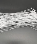 5 Inch Security Beaded Loop Ties Plastic Price Tag Fasteners Adjustable Pin Lock Merchandise Seals For Clothing Shoes And Luggage 1000 Pack White on a dark surface.