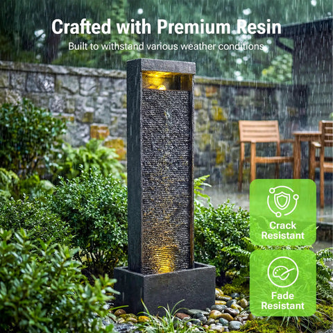 35 Inch Outdoor Water Fountain With Modern Curved Faux Slate Resin Waterfall And 2 Warm LED Lights For Garden Patio Yard Deck Porch Balcony Decor Home Art Water Feature In Black Keeps Your Outdoor Vibe On Point in a garden setting