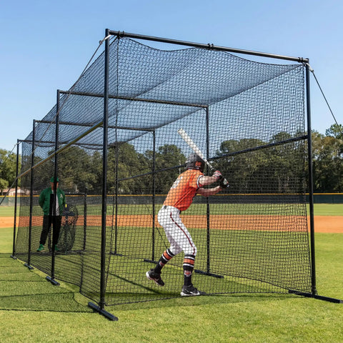 Person batting in 40 Foot Batting Cage With Net And Frame For Baseball Softball Hitting And Pitching Practice Heavy Duty Framed Backyard Training Cage