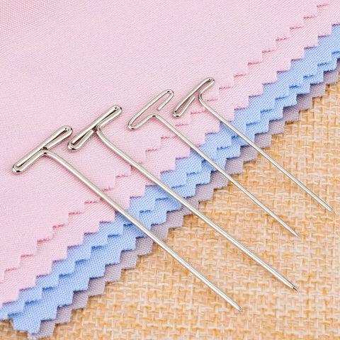 Heavy Duty Stainless Steel T Pins For Blocking And Knitting on pink and blue fabric, showing 38mm and 51mm sizes.