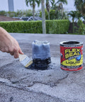 Brushing Liquid Rubber Sealant on roof, 16 oz can visible, watertight flexible coating, breathable and UV resistant