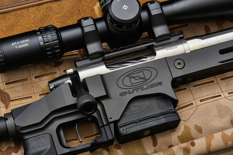 Close-up of Modular Rifle Chassis for Remington 700 Short Action 3.0 Inch AICS with rail system and scope, USA-made