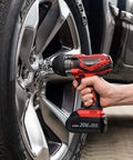 Person using Beefy 20V Cordless Impact Wrench Kit With 300 Ft Lb Torque on car tire lug nuts