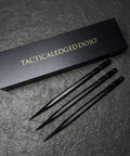 Set Of 3 Bo Shurikens With Precision Balanced Throwing Spikes Hexagonal Body For Stable Grip next to box on textured surface.