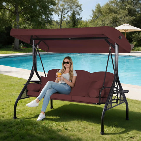Three Seat Outdoor Porch Swing With Adjustable Canopy And Convertible Bed Two In One Patio Glider For Adults Cup Holder And Pillow Burgundy Red Backyard Relaxation by poolside with woman sitting