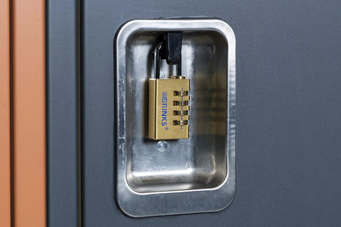 Beefy 30mm Solid Brass Padlock With Chrome Plated Hardened Steel Shackle, 4-Dial Resettable Combination Lock attached to a cabinet
