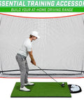 Golfer using All Weather Golf Ball Tray For Hitting Mats, 70 Ball Capacity, in front of net setup, practicing swing, green mat visible.