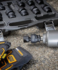 13 Piece One Half Inch Drive 6 Point Impact Socket Set SAE Heavy Duty CrMo Steel with gloves and power tool on concrete