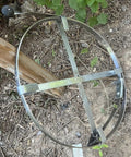 Heavy Duty Manganese Steel Drain Snake Whips Gnarly Outdoor Yard Clogs In Four To Sixteen Inch Pipes With A Two Inch Diameter And Eighty Two Foot Reach For Commercial Driveways seen from above, showcasing sturdy circular design.