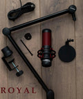 Adjustable Dope Broadcast Microphone Arm With Desk Mount 360 Degree Rotatable Scissor Arm components on wooden surface