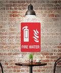 Built Tough Fire Water Supply Caution Sign 8 By 12 Inch No Rust Nonsense Reflective Aluminum Warning Plate displayed in a cafe.