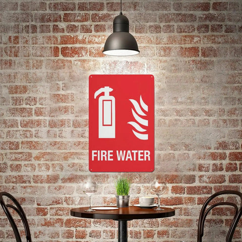 Built Tough Fire Water Supply Caution Sign 8 By 12 Inch No Rust Nonsense Reflective Aluminum Warning Plate displayed in a cafe.