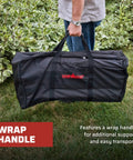 Person carrying black Carry Bag For Two Burner Stoves Heavy Duty Case With Weather Resistant Liner Wrap Around Handles And EZ Glide Zippers