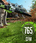 Man using Cordless Leaf Blower With Turbo Mode, This Beast Delivers Up To 765 CFM And 200 MPH Air, Clears Wet Leaves And Heavy Debris, Up To 90 Minutes Runtime With 5Ah Battery, Battery And Charger Not Included LB7650 on green lawn