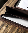 Close-up of Career Game Changer Business Padfolio With Heavy Duty Zipper Closure Crafted From Smooth Pu Vegan Leather, showing interior storage slot.