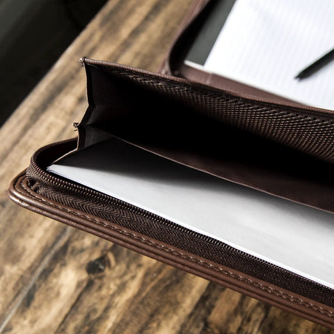 Close-up of Career Game Changer Business Padfolio With Heavy Duty Zipper Closure Crafted From Smooth Pu Vegan Leather, showing interior storage slot.