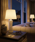 Bright White Ceramic Table Lamp With Bubble Pattern, 25.5 Inch Tall, 13.5 Inch Drum Shade in a cozy living room setting