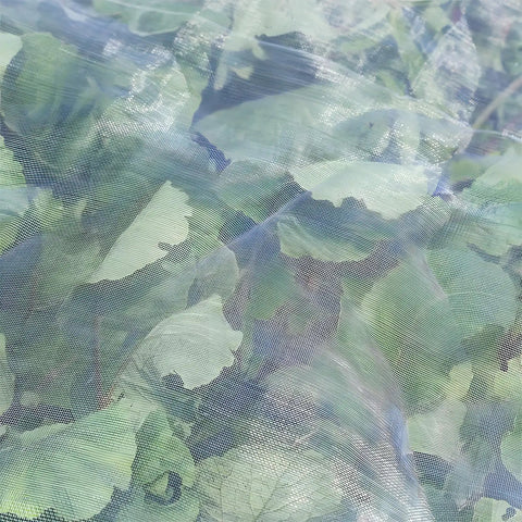 2 Pack 10x30 Ft Ultra Fine Garden Netting Mesh Barrier for Patio and Raised Beds installed over leafy plants