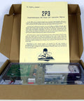 AM Radio Receiver DIY Kit For Enthusiasts open box with step-by-step guide and components for building a portable radio case