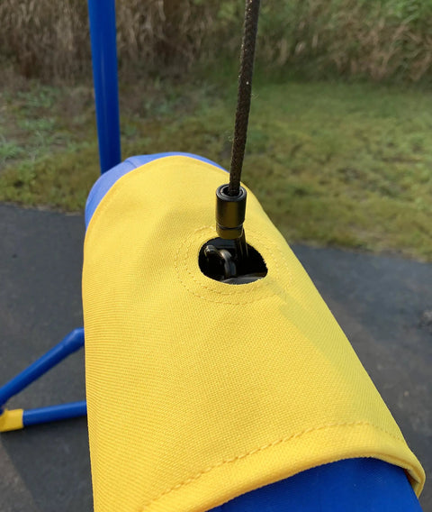 Close-up of Endurance Agility Tire Jump for Dogs With Lightweight PVC Frame showing yellow and blue components and cord detail.