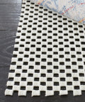 Non Slip Rug Pad Under Carpet That Keeps It Stuck To All Hard Floors, Grippy Anti Slip Runner Mat Stays Put shown under rug