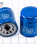 Genuine OEM Honda Oil Filter 15400-PLM-A02 direct fit blue part for cars and SUVs, showing side and top view on grid background.