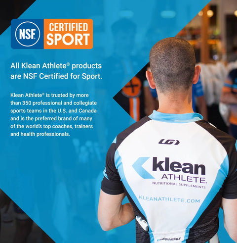 Back view of cyclist wearing Klean Athlete jersey in gym, featuring NSF Certified for Sport, emphasizing trust by athletes.