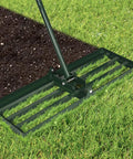 Pro Grade Lawn Leveling Rake With 78 Inch Adjustable Handle Heavy Duty Stainless Steel Ground Plate on grass and soil