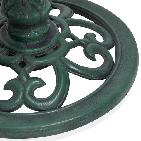 Close-up of the ornate scrollwork base on the Pedestal Birdbath with Scrollwork in Aged Green for outdoor gardens and patios.