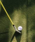 ButterBlade Training Club For Golfers, Real Time Feedback To Improve Swing Mechanics And Accuracy, club on green with ball