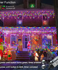 House decorated with Green Outdoor Icicle Christmas Lights 33ft 400 LED With Connectable Clear Wire 8 Modes Timer Waterproof Plug In.