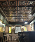 Laurel Wreath Faux Tin Ceiling Tile 2x2 PVC Antique Copper Finish in pub setting, easy glue-up or drop-in install, covers 40 sq ft