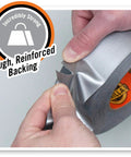 Close-up of Heavy Duty Silver Duct Tape 1.88 Inch By 35 Yard Double Thick Adhesive being torn by hands, showcasing reinforced backing.