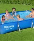 Family enjoying Steel Pro Deluxe Splash Frame Above Ground Pool For Endless Summer Fun In The Backyard, Durable Steel Frame, Easy Setup.
