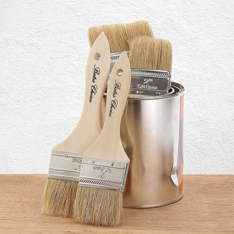 9 Pack 2 Inch Chip Paint Brushes With Thick Natural Bristles displayed with metal paint can on wooden surface