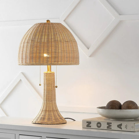 Bohemian Rustic 22 Inch LED Table Lamp With Natural Rattan Shade And Brass Gold Finish on white console table in living room