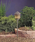 Six Groove Path And Spread 1 Light 120V Outdoor Wall Light in bronze on garden path background