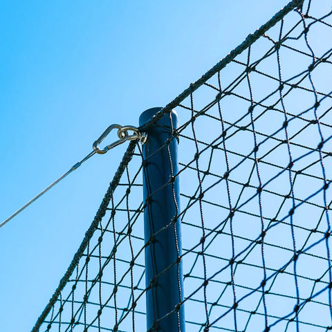 Galvanized steel upright with #42 netting from 35 Ft Ultimate Baseball Batting Cage With Net And Poles Package against blue sky